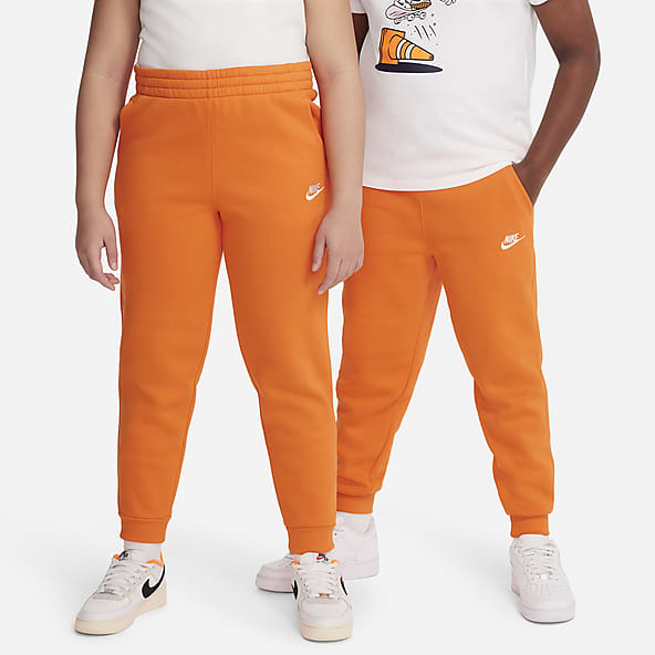 Naranja Sin forro Pants de entrenamiento. Nike US